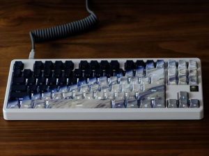 Side-engraved translucent globe keycaps